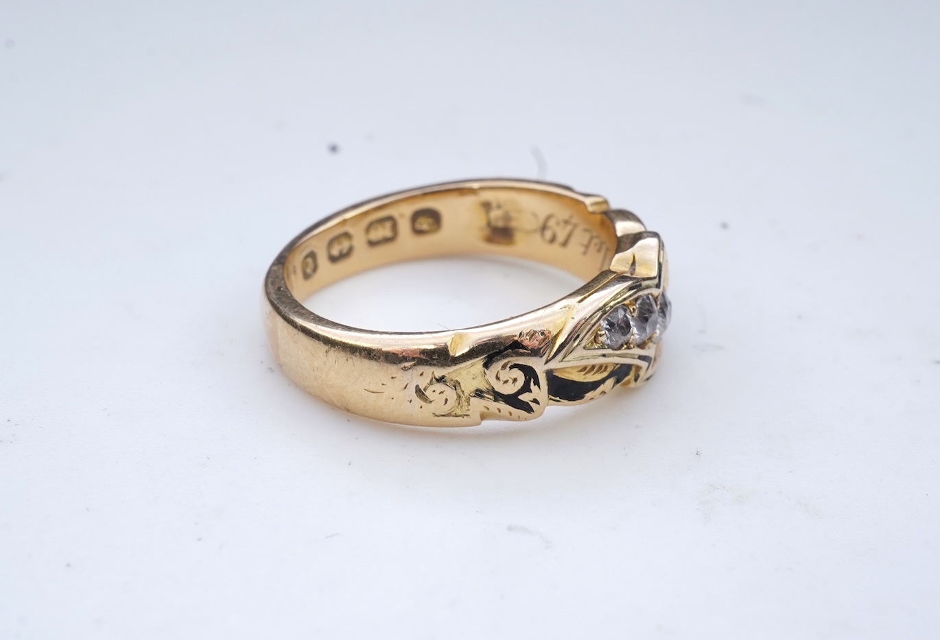 A Victorian enamel and diamond mourning ring, circa 1872